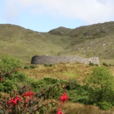 Staigue Stone is a ruined stone ringfort three miles west of Sneem, on the Iveragh Peninsula
